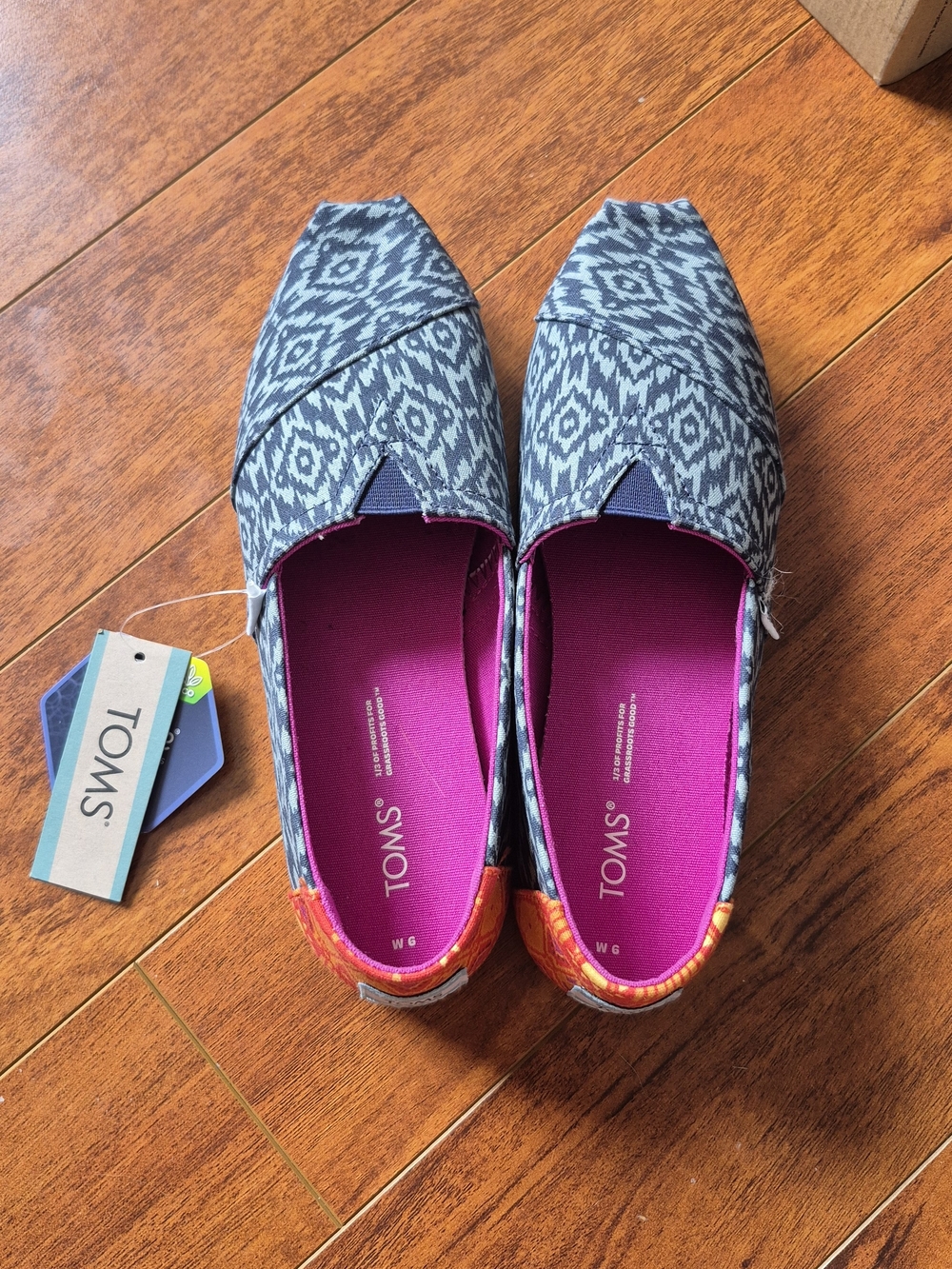 Toms Women's Blue Aztec Slip-On Flats with Pink Insole and Orange Heel Accent